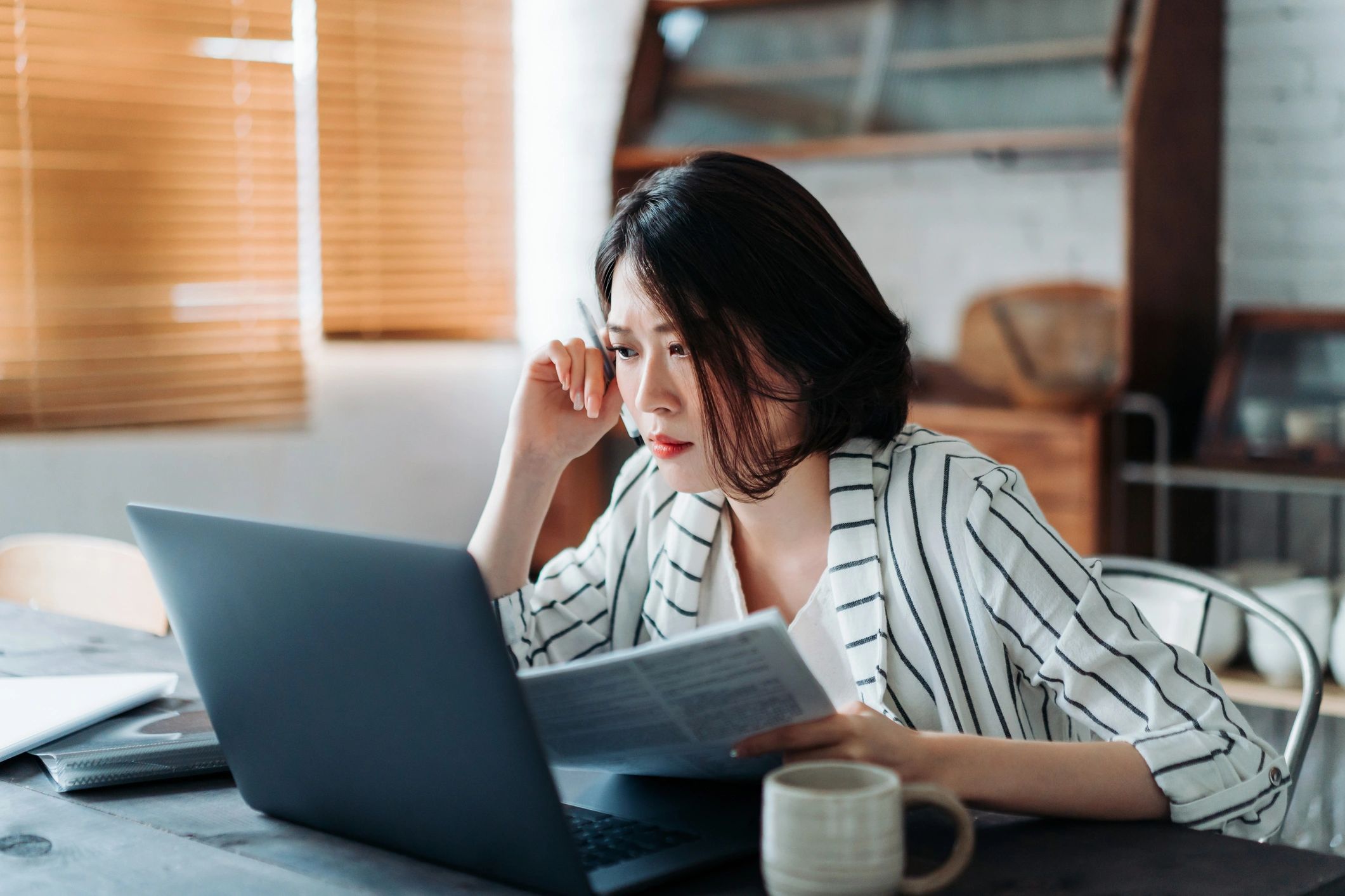 Property management professional reviewing documents